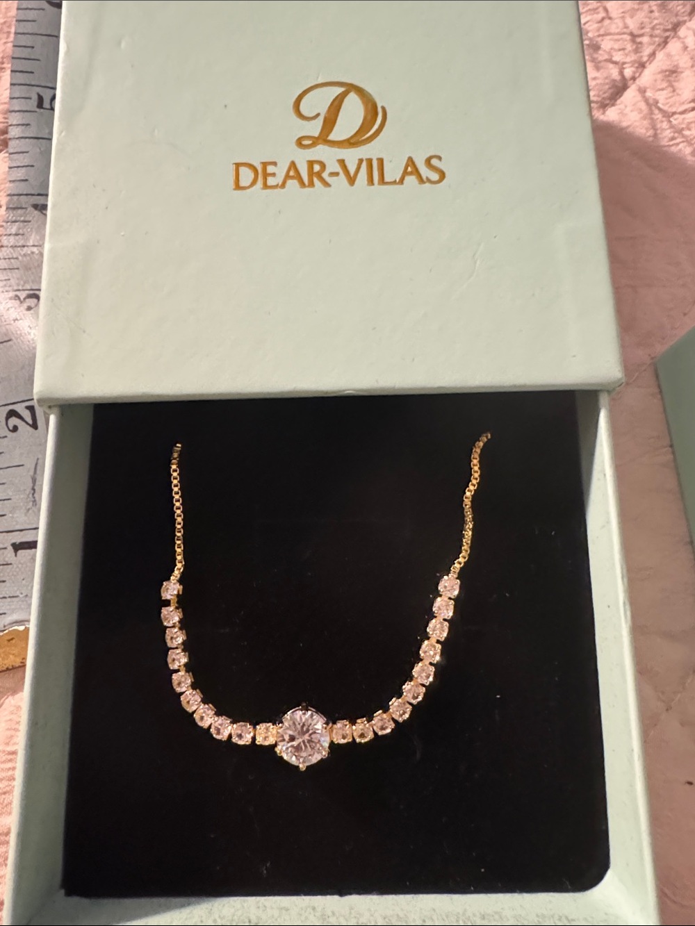 Gold Tennis bracelet with Clear Crystal Center